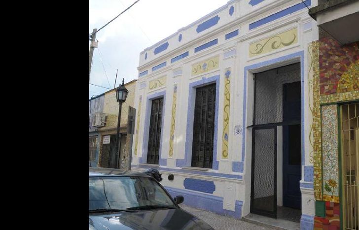 la tarea reúne a pintores, vecinos y comerciantes.