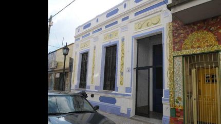 la tarea reúne a pintores, vecinos y comerciantes.