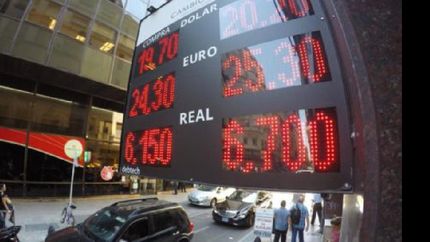 el dolar alcanzo un nuevo record y cerro a $20,20