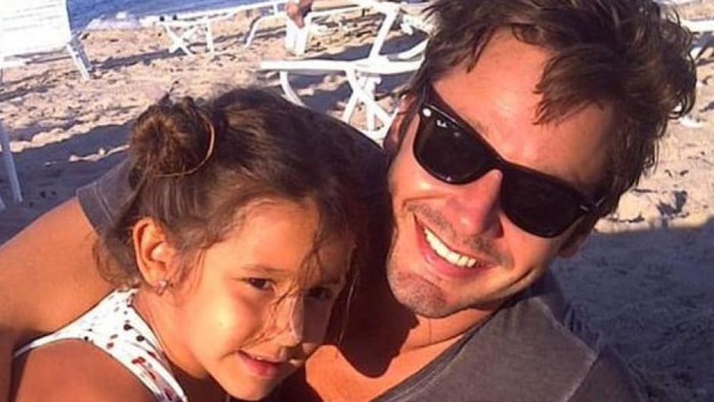 Blanquita junto a su papá.