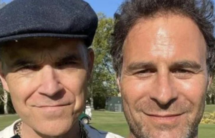 Martín y Robbie, amigos.