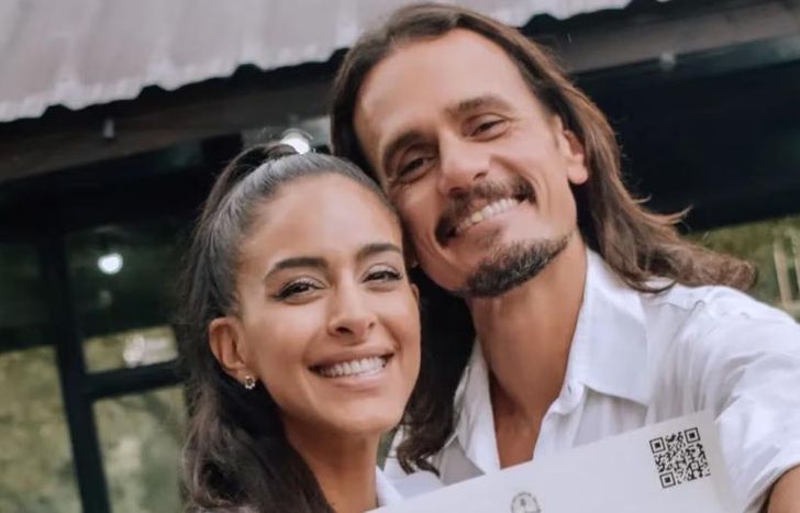 Christian Sancho y Celeste Muriega, con libreta.