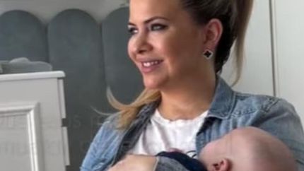 Alejandra Maglietti y su hijo Manu.