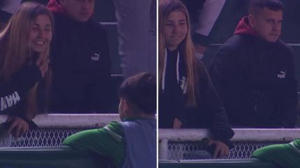 Maxi y Maitena, captados por la trasmisión oficial.