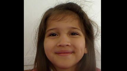 Melody estaba cerca de su casa.