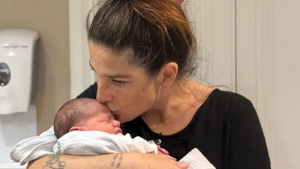 Juana Repetto y su tercer hijo Timoteo.