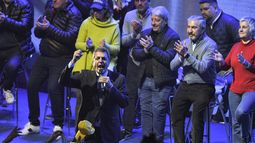 Junto a Agustín Rossi y Wado de Pedro.
