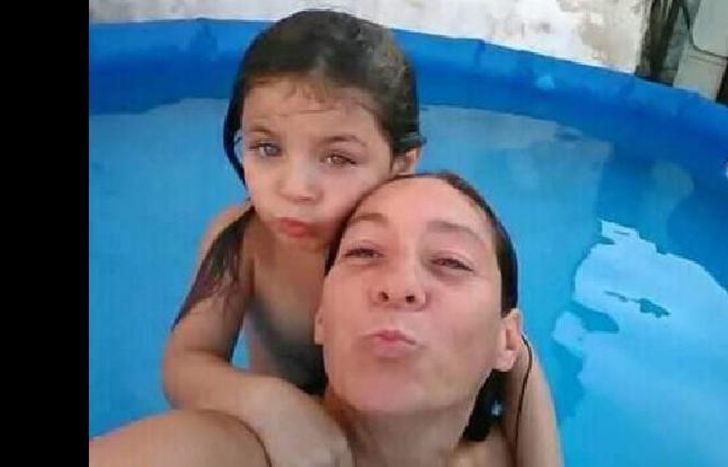 el novio de la mujer está detenido acusado del doble crimen.