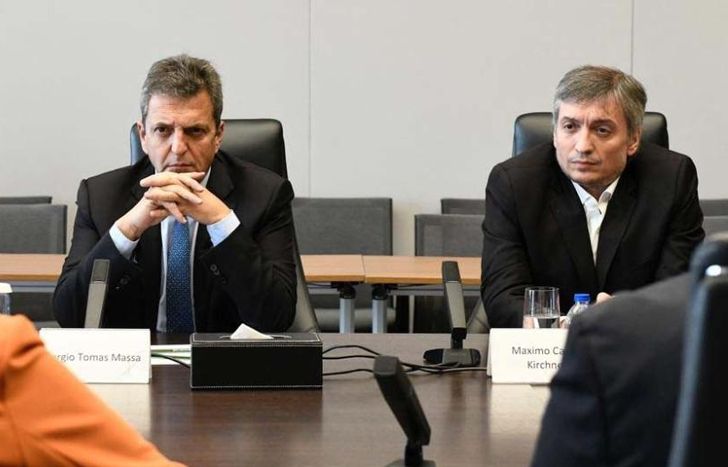 Massa y Máximo, en plena gira, en una reunión.