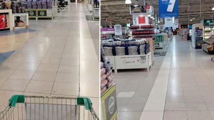 Los pasillos del hipermercado lucen vacíos en pleno horario comercial.