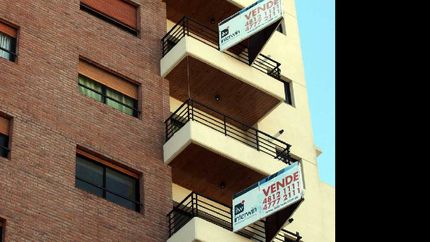 celebran la quita del recargo en dolares para adquirir prestamos hipotecarios