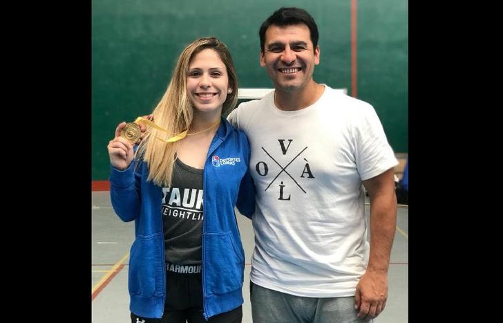 Florencia y su entrenador, felices tras la consagración.