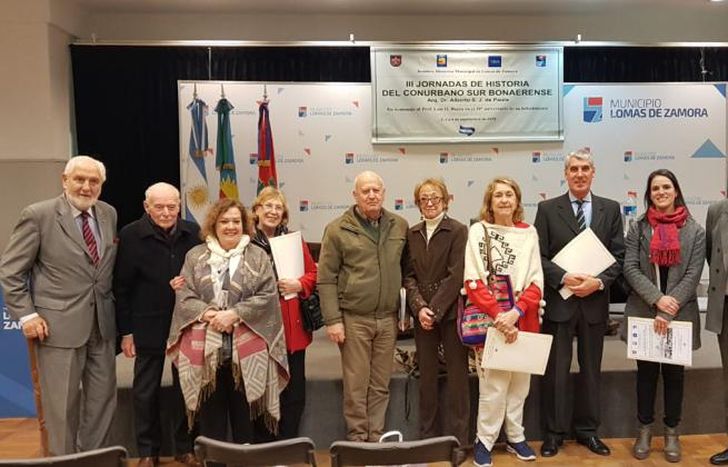 Grassi y las autoridades salientes.