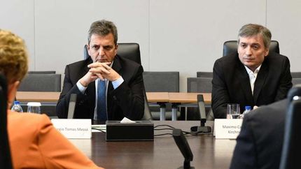 Massa y Máximo, en plena gira, en una reunión.